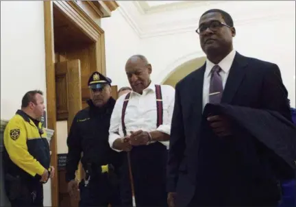  ?? MARK MAKELA — POOL (VIA AP) ?? A handcuffed Bill Cosby leaves the courtroom in Norristown, Pa., after he was sentenced on Tuesday.