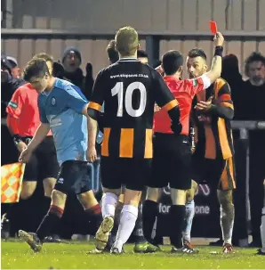  ??  ?? Seeing red: Huntly’s Gary McGowanis sent off