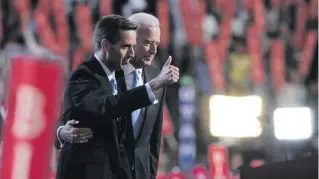  ?? (Photo by Justin Sullivan/Getty Images) ?? The late Delaware Attorney General Beau Biden (L) stands with his father U.S. Democratic Vice-Presidenti­al nominee Sen. Joe Biden during day three of the Democratic National Convention at the Pepsi Center.