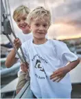  ??  ?? Left: Hugo (left) and Felix Hall. Right: the Hall family’s 20-year-old Hallberg-rassy 46 was bought last summer, lying in La Rochelle