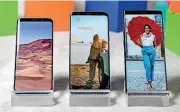  ??  ?? A Samsung Galaxy S8, left, a Samsung Galaxy S8 Plus, center, and Samsung Galaxy Note 8 are on display in New York.