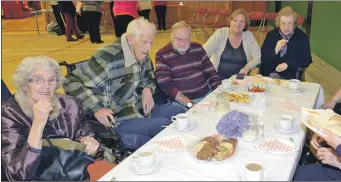  ??  ?? From front left: Nancy McCrae, George Townsley, Ross McKinnon, Betty Maso Caroline Pearce, Jessie Graham and Sandy Ward all from Kintyre Care Home.