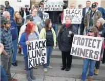  ?? ALEX SLITZ ?? In the Kentucky town of London two Decembers ago, Patty Amburgey talked about the death of her husband from black lung disease. She and others gathered to advocate for the Black Lung Disability Trust Fund, which mining companies must pay into to help pay medical costs for more than 25,000 former miners with black lung.