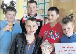  ??  ?? Daniel Vaughan, Liam Fitzmauric­e, Danny Linehan, Cillian O Sullivan, and Kane Desmond were asking 'How many sweets in the jar' during the May Fayre at Ballyhass National School. Photo by Sheila Fitzgerald.