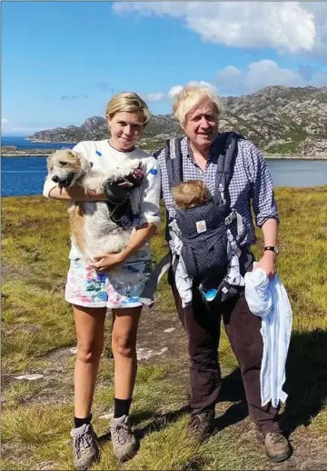  ??  ?? GETTING AWAY FROM IT ALL: Boris and Carrie enjoying their Scottish holiday with baby