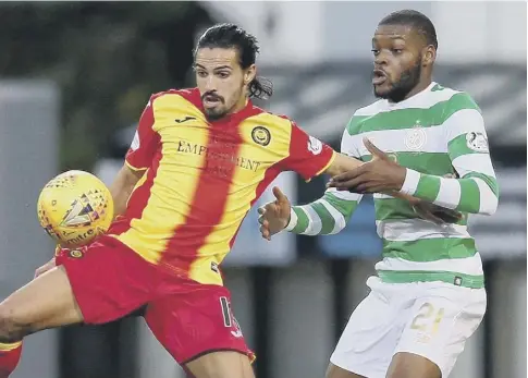  ?? PICTURE: JANE BARLOW/PA ?? 0 Olivier Ntcham challenges Partick’s Ryan Edward during Celtic’s 1-0 win at Firhill on Friday.