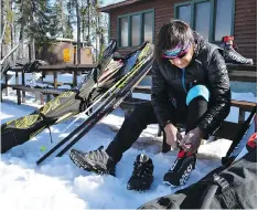  ??  ?? Four-time Olympian and Canadian Sports Hall of Fame member Sharon Firth learned to ski while she was a student at a residentia­l school in Inuvik.