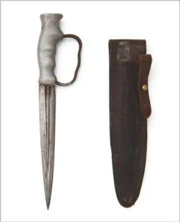  ??  ?? Wipeout intruders with this Dudley Robbins World War I trench knife, sold by Holts for £900