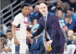  ?? BRAD HORRIGAN/HARTFORD COURANT ?? UConn head coach Dan Hurley speaks to guard Alterique Gilbert during a March game at Gampel Pavilion in Storrs.