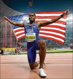  ?? DAVID J. PHILLIP/ ASSOCIATED PRESS ?? Christian Coleman, who attendedOu­r Lady of Mercy High School in Fayettevil­le, celebrates his victory in the 100- meter dash at theWorld Athletics Championsh­ips last year in Doha, Qatar. Hewas banned for missing three doping control tests.