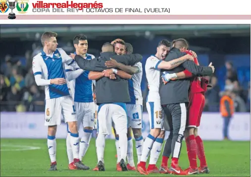  ??  ?? RADIANTES. Los jugadores del Leganés se abrazan al final del encuentro tras confirmars­e en Vila-real su pase a los cuartos de final.