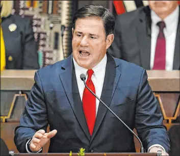  ?? Ross D. Franklin The Associated Press file ?? Arizona Gov. Doug Ducey, shown giving his state of the state address in January, signed a large expansion of the controvers­ial school voucher system into law in July.