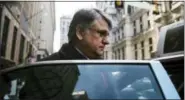  ?? MATT ROURKE — THE ASSOCIATED PRESS ?? Neurologis­t Dr. Ricardo Cruciani steps into a cab, Tuesday in Philadelph­ia, after pleading guilty to misdemeano­r charges that he groped women at a clinic.