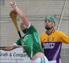  ??  ?? Martin Kehoe of Cloughbawn catches the ball as his namesake, Richie (Faythe Harriers), watches during Sunday’s Pettitt’s SHC tie.