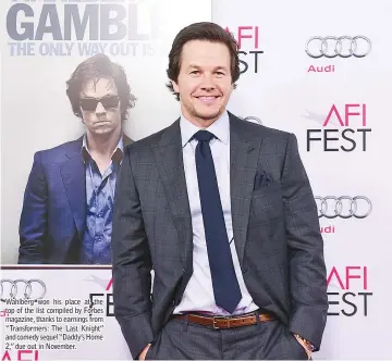  ??  ?? Wahlberg won his place at the top of the list compiled by Forbes magazine, thanks to earnings from “Transforme­rs: The Last Knight” and comedy sequel“Daddy’s Home 2,” due out in November.