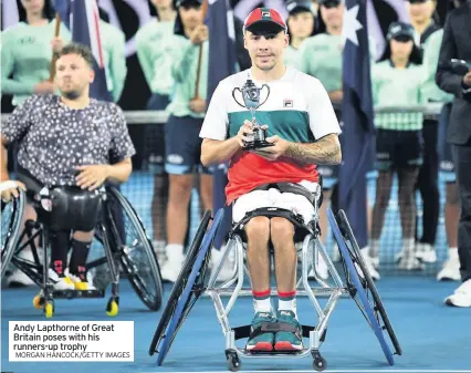  ?? MORGAN HANCOCK/GETTY IMAGES ?? Andy Lapthorne of Great Britain poses with his runners-up trophy