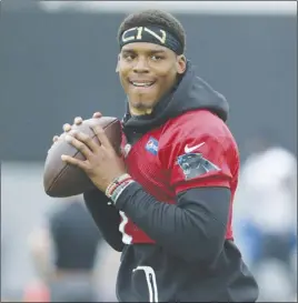  ?? AP PHOTO ?? Carolina Panthers coach Ron Rivera says quarterbac­k Cam Newton is ahead of schedule in his rehab from shoulder surgery and is expected to begin throwing next week at minicamp.