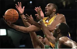  ?? THE ASSOCIATED PRESS FILE PHOTO ?? The late Kobe Bryant of the Los Angeles Lakers, shown driving against the Boston Celtics, is a shoo-in for the Naismith Memorial Basketball of Fame class of 2020.