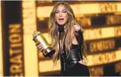  ?? CHRIS PIZZELLO INVISION/AP ?? Jennifer Lopez accepts the Generation Award at the MTV Movie & TV Awards on Sunday in Santa Monica.