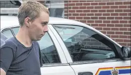  ?? COMPASS FILE PHOTO ?? Troy Dobbin is led into court in Harbour Grace in a file photo.