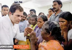  ?? PTI ?? Congress President Rahul Gandhi interacts with the flood- affected people at a relief camp in Chengannur, Kerala on Tuesday. —