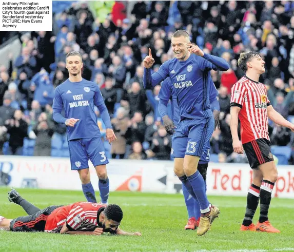  ??  ?? Anthony Pilkington celebrates adding Cardiff City’s fourth goal against Sunderland yesterday PICTURE: Huw Evans Agency