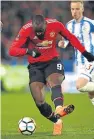  ?? Pictures: Getty. ?? Top: Harry Kane found the target for Spurs after being brought on as a substitute. Above: a Romelu Lukaku double gave Manchester United victory at Huddersfie­ld.