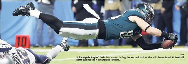  ?? File ?? Philadelph­ia Eagles’ Zach Ertz scores during the second half of the NFL Super Bowl 52 football game against the New England Patriots.