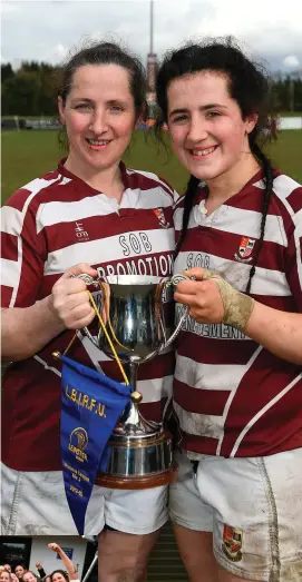  ?? RAMSEY CARDY/SPORTSFILE ?? Tullow player Maggie Kelly and her daughter Grace celebrate after winning the Women’s Leinster League Division 2 final against Suttonians. Left: Captain Alex O’Brien, sister of Ireland star Sean, lifts the trophy surrounded by her team-mates