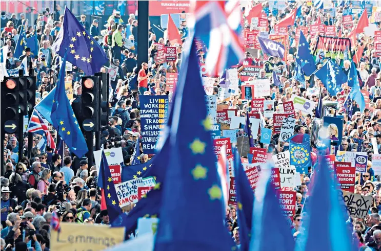  ??  ?? An estimated 700,000 protestors joined the march, including Sir Bob Geldof, below