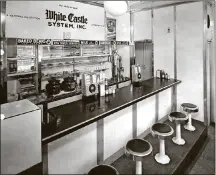  ??  ?? The interior of a White Castle restaurant in an earlier era. The Columbus-based chain turned 100 years old this month.