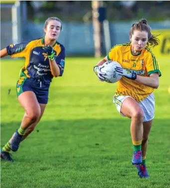  ??  ?? Gráinne Carty in possession for Tourlestra­ne in the All-Ireland Junior Club final in Ballinaslo­e. Pics: Tom Callanan.