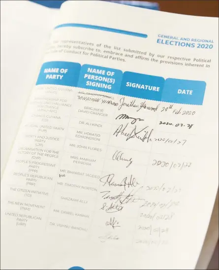  ?? (Department of Public Informatio­n photo) ?? The Guyana Elections Commission Code of Conduct bearing the signatures of the representa­tives of nine of the 11 parties contesting Monday’s general elections