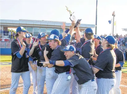  ?? PHOTOS BY DOUGLAS KILPATRICK/SPECIAL TO THE MORNING CALL ?? Southern Lehigh celebrates after the Spartans’ 10-9 Colonial League championsh­ip game win over Notre Dame-Green Pondat DeSales University on Thursday.