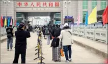  ?? PROVIDED TO CHINA DAILY ?? Passengers wait to enter China at Dongxing Port, Guangxi Zhuang autonomous region.