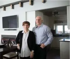  ?? NICK KOZAK FOR THE TORONTO STAR ?? Greg and Bozana Ilic in the restored cottage behind their heritage home.