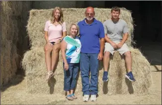  ?? The Sentinel-Record/Richard Rasmussen ?? A FAMILY AFFAIR: From left, Allyson Dunbar, Gina Moore, Donny Moore and Kevin Moore are the 2017 Garland County Farm Family of the Year.