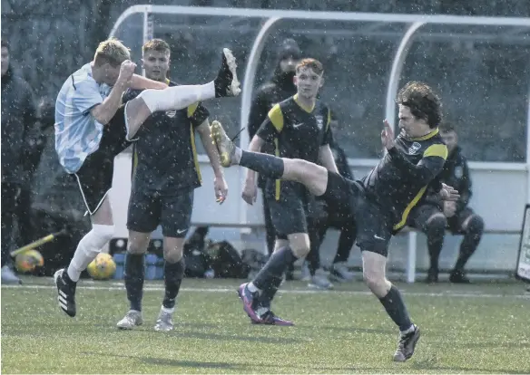  ?? ?? Washington, in dark blue, in action against Birtley in the Northern League Division Two at Ford Hub Sports Complex on Saturday – Washington won 5-4.