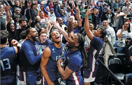  ?? AP PHOTO/PAUL SANCYA ?? Players for 16th-seeded Fairleigh Dickinson celebrate after beating East Region No. 1 seed Purdue 63-58 in the first round of the NCAA tournament on Friday in Columbus, Ohio. It’s just the second time a No. 16 seed has beaten a No. 1 seed in March Madness.