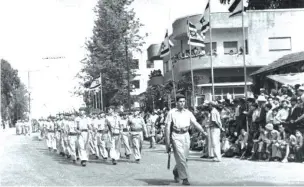  ??  ?? MEMBERS OF Kibbutz Gan Shmuel march on Israel’s second Independen­ce Day, in Hadera in 1950.