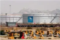  ?? The Associated Press ?? ■ Storage tanks are seen on March 21, 2021, at the North Jiddah bulk plant, a Saudi Aramco oil facility, in Jiddah, Saudi Arabia. The oil giant said Sunday it earned a $161 billion profit last year, attributin­g its earnings to higher crude oil prices.