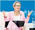  ??  ?? In the pink: Emma Walmsley, chief executive of Glaxosmith­kline, left, and Helle Thorning-schmidt, below left, at conference­s in China and Greece last year