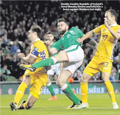  ??  ?? Double trouble: Republic of Ireland’s Daryl Murphy (below and left) hits a
brace against Moldova last night