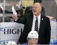  ?? AP PHOTO/GENE J. PUSKAR ?? New York Rangers head coach Gerard Gallant gives instructio­ns during the first period of an NHL hockey game against the Pittsburgh Penguins in Pittsburgh, Tuesday, March 29, 2022. The Rangers won 3-2.