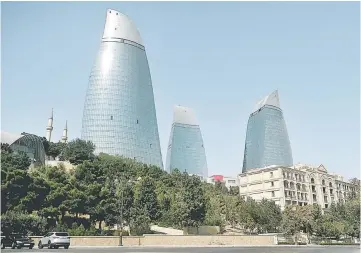  ??  ?? These three buildings belonging to Fairmont Azerbaijan Hotel are the main tourist attraction in Baku, Azerbaijan. Najib will make his first official visit to Azerbaijan from Sept 11-12. — Bernama photo