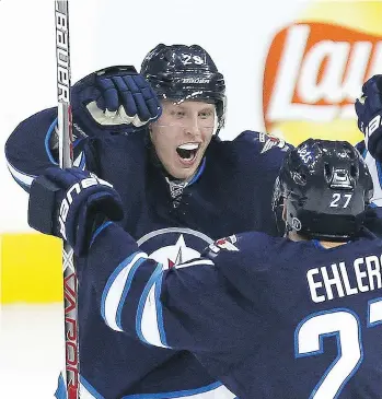  ?? BRIAN DONOGH ?? All eyes are on Winnipeg Jets right-winger Patrik Laine, who scored a hat trick Wednesday in his first face-to-face meeting with 2016 draft rival Auston Matthews of the Toronto Maple Leafs.