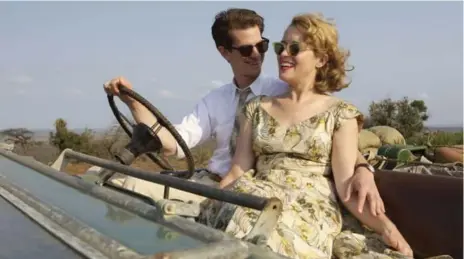  ?? BLEEKER STREET/TRIBUNE NEWS SERVICE ?? Andrew Garfield, seen here with Claire Foy in Breathe, plays Robin Cavendish, a man who becomes paralyzed from the neck down due to polio.