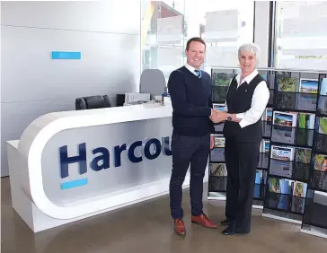  ??  ?? Sally Jones of Sally J Real Estate sold the management of her rent-roll to Evan Broadbent of Harcourts Warragul recently.