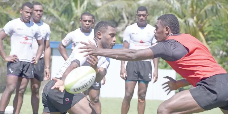  ??  ?? Kalioni Nasoko (right) tries to stop Sevuloni Lutu’s offload during the team training at Bidesi Ground yesterday.