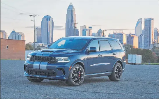  ?? FCA ?? The 2021 Dodge Durango SRT Hellcat features a new aggressive exterior and a new interior with a driver-centric cockpit and delivers 710 horsepower.